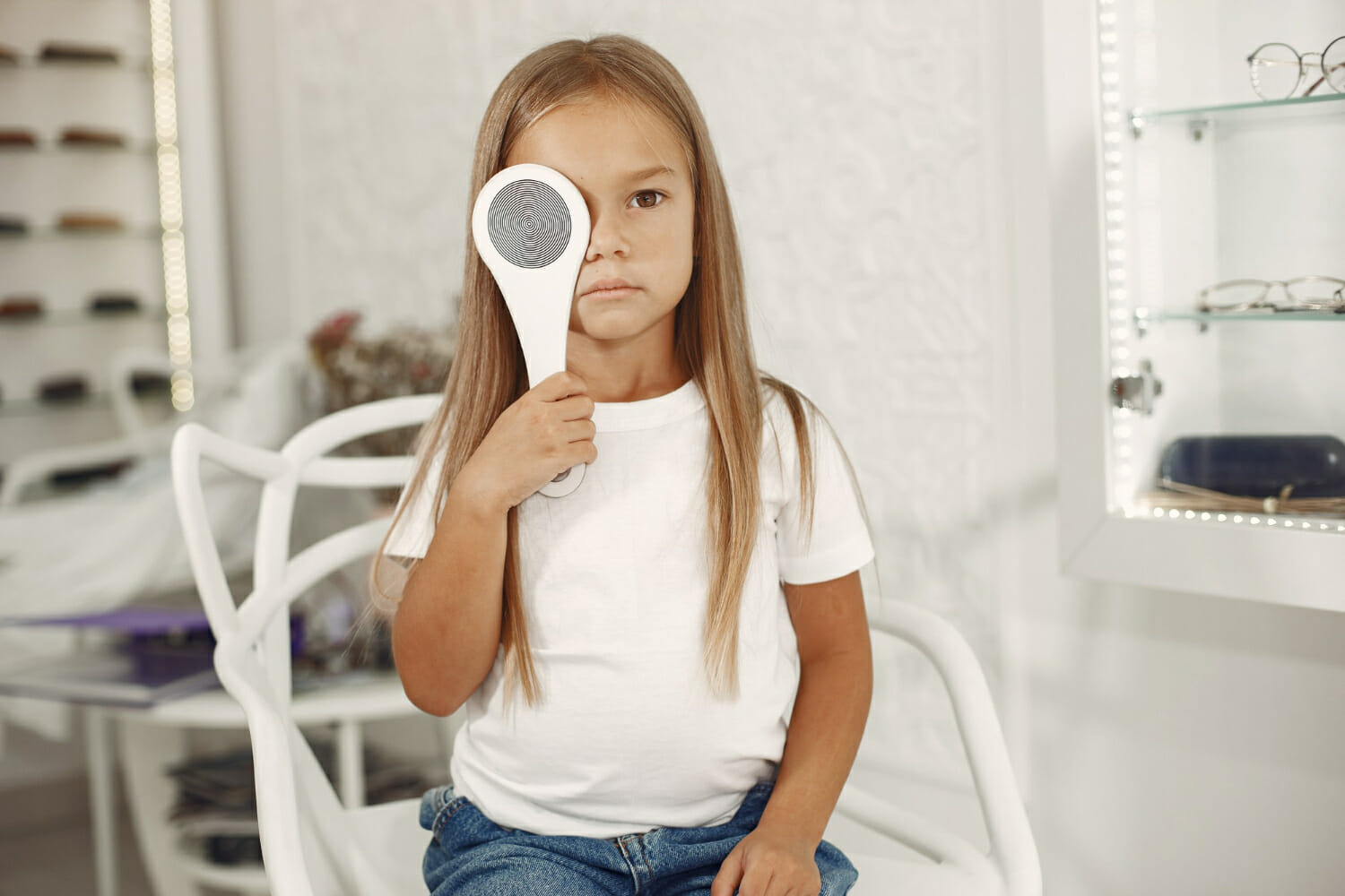child-eye-test-eye-exam-little-girl-having-eye-check-up-with-phoropter-eye-test-children (1)